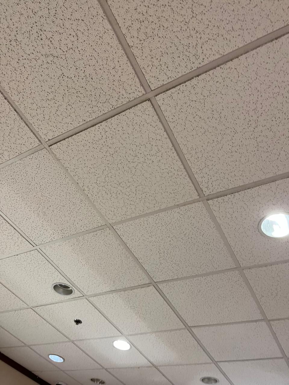 Clean acoustic ceiling tiles after replacement